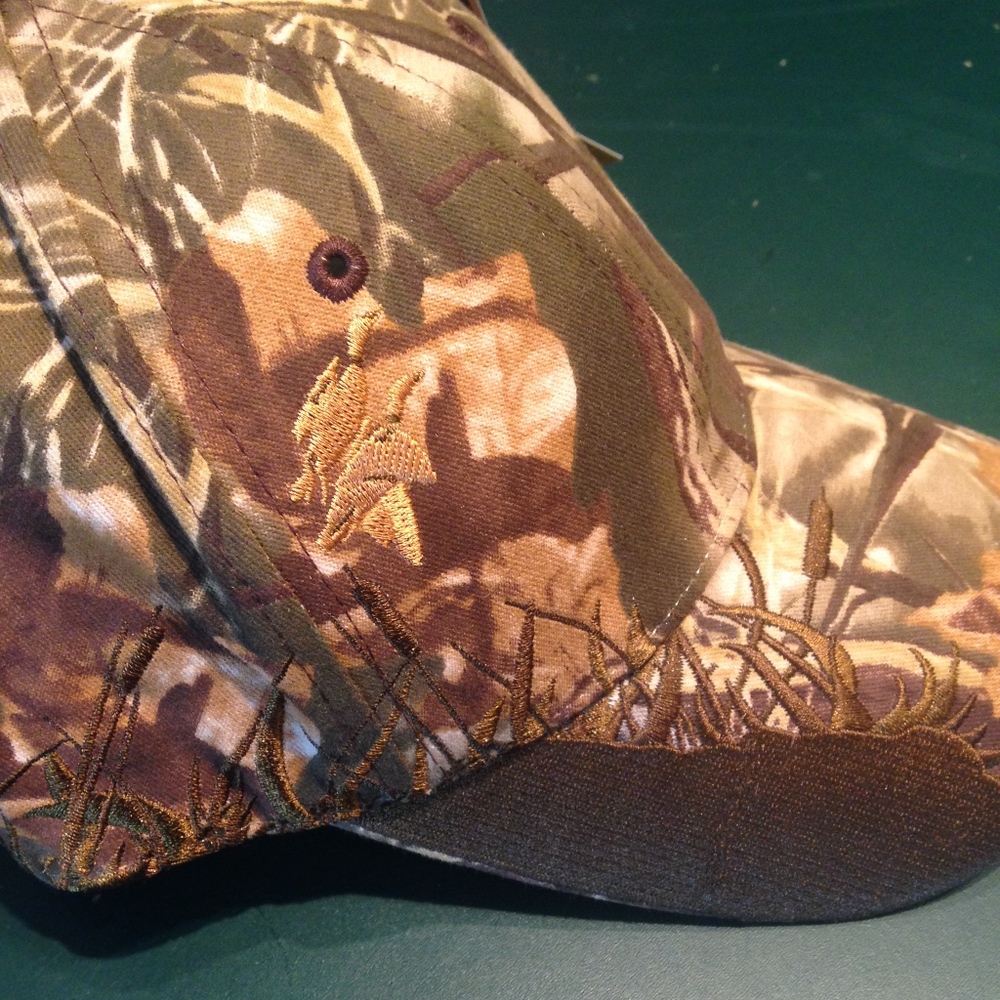 Camo hat with ducks flying